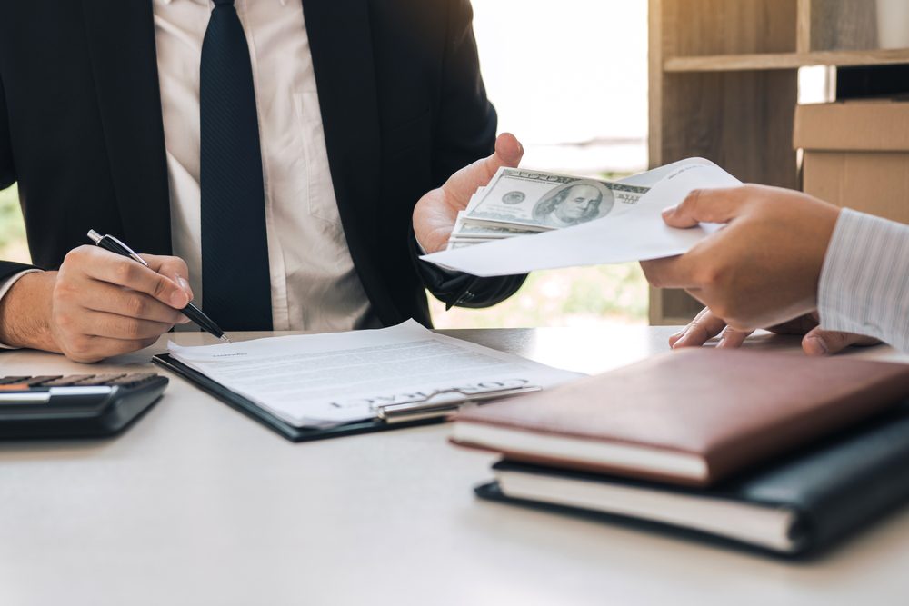 Cash bills illustrating an inheritance advance