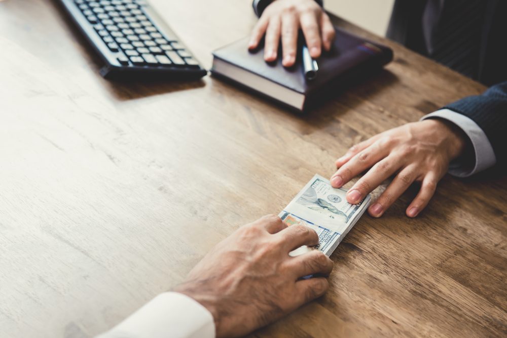 Cash bills illustrating an inheritance cash advance