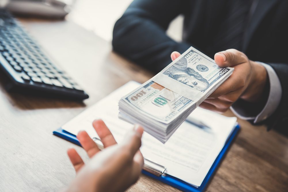 Cash bills illustrating a propate loan